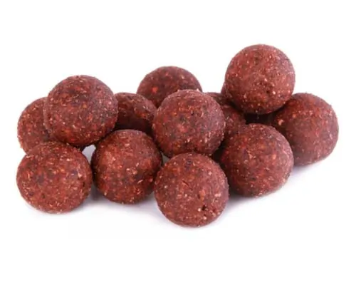 A close up photo of some red Juvanzé Special boilies.